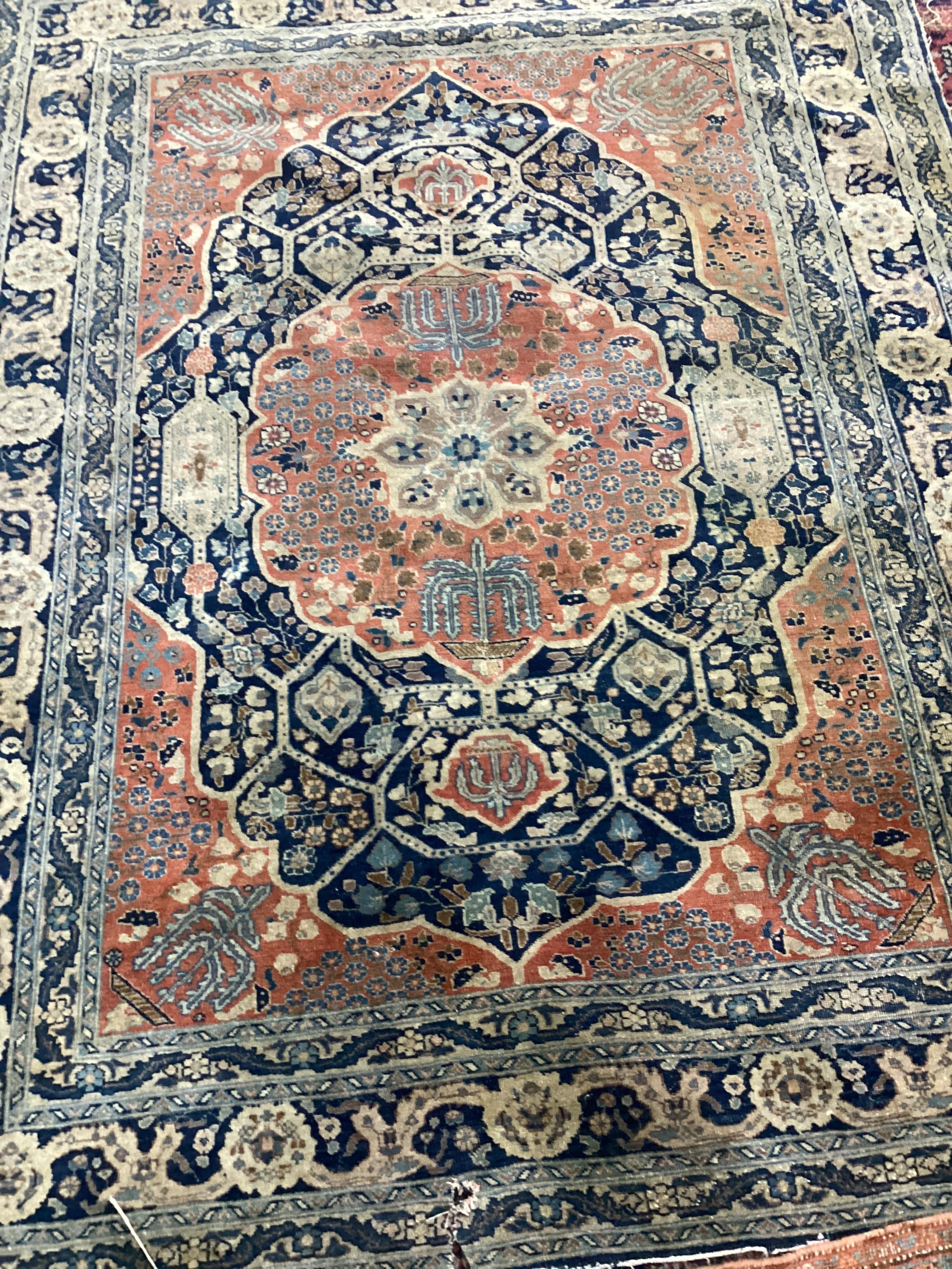 Four antique North West Persian and Caucasian rugs, largest 180 x 142cm